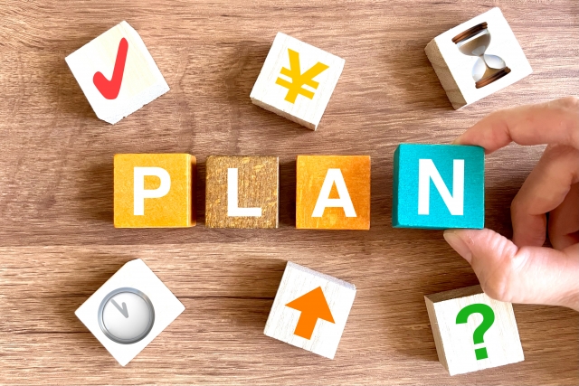 PLANと書かれたブロックを並べるイメージ